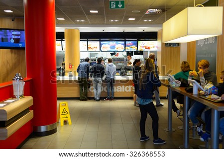 PRAGUE, CZECK REPUBLIC - AUGUST 18, 2015: McDonald\'s restaurant. McDonald\'s is the world\'s largest chain of hamburger fast food restaurants, founded in the United States.