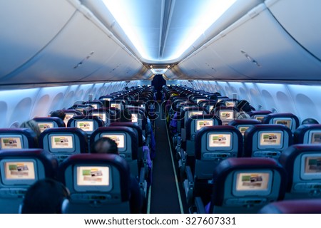 KUALA LUMPUR, MALAYSIA - MAY 12, 2014:  Malaysia Airlines Boeing 737 interior. Malaysia Airlines is the flag carrier of Malaysia and a member of the Oneworld airline alliance