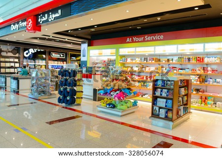 DUBAI, UAE - APRIL 18, 2014: the interior of Concourse A. The concourse includes one 4 star hotel and one 5 star hotel, first and business class lounges, and duty-free areas