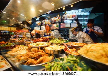 SINGAPORE - NOVEMBER 08, 2015: choice of prepared food in cafe at the food court of The Shoppes at Marina Bay Sands. The Shoppes at Marina Bay Sands is one of Singapore\'s largest luxury shopping malls