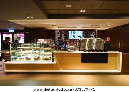 HONG KONG - JANUARY 27, 2016: interior of McCafe. McCafe is a coffee-house-style food and drink chain, owned by McDonald\'s.