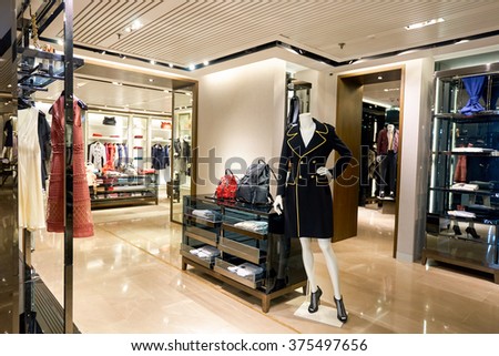 HONG KONG - JANUARY 27, 2016: interior of Burberry store. Burberry Group plc is a British luxury fashion house, distributing outerwear, fashion accessories, fragrances, sunglasses, and cosmetics.