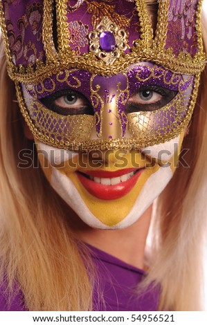 pretty young smiling woman in half mask