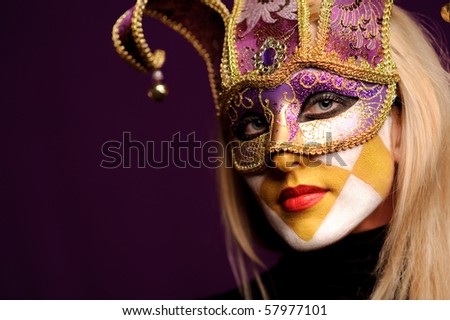 young sexy woman in violet party half mask. may be use for fashion makeup concept