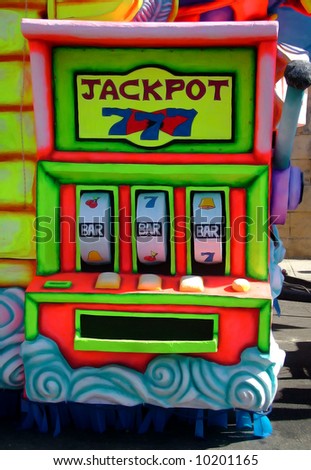 A carnival float depicting a lucky 7 jackpot slot machine
