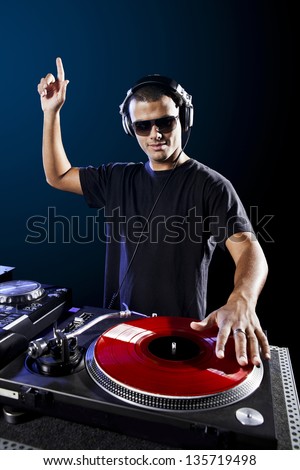 Dj playing disco electro music in a concert