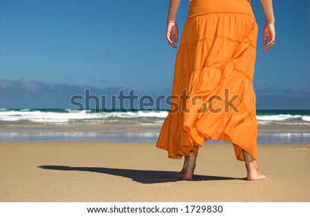 Alf woman with a orange skirt