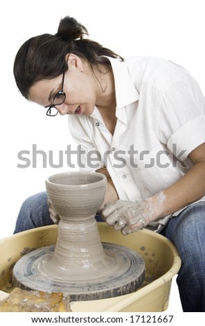 Picture of a potter works a potter\'s wheel