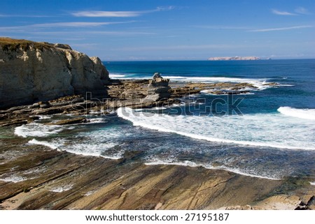 Landscape picture of a beautiful beach with rocks