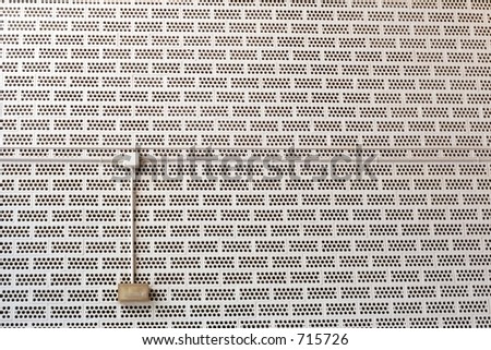 white bricks wall with an emergency light