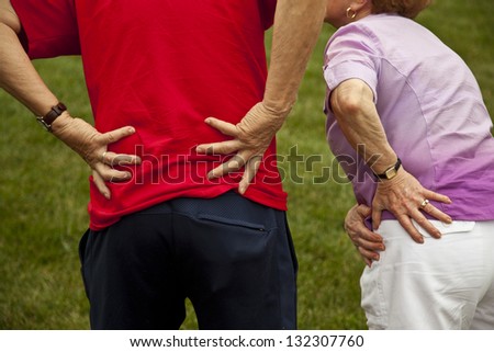 Senior couple with back and hip pain