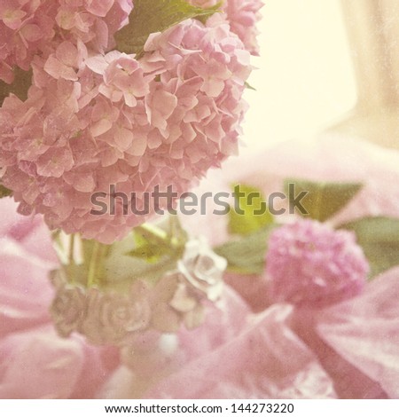 Hydrangea bouquet in the soft window light with a soft shabby chic texture