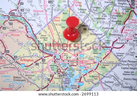 Atlas map showing Washington D.C. pinpointed by a red thumb tack