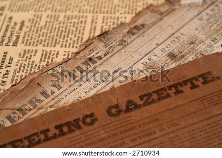 Authentic antique newspapers form the 1800\'s- tattered and torn with age