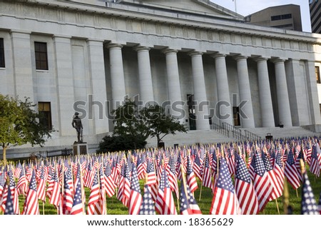 flags fly in the lawn at the Ohio Statehouse to commemorate those who died 9/11
