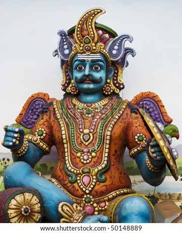 Colourful statue of an Hindu god in Tamil Nadu, India