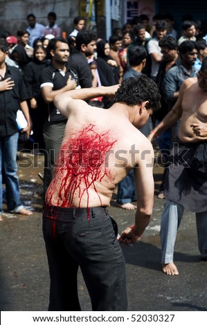 INDIA - MUHARRAM DECEMBER 28:In Muharram people beat their chest and followers practice self-flagellation, drawing blood 28 December,2009 in Chennai, India