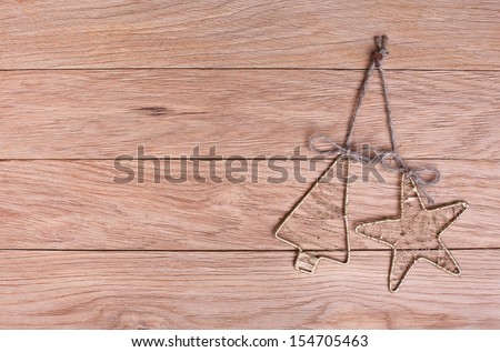 Vintage Christmas decorations on a background of old oak boards