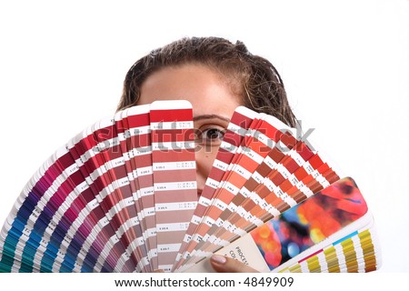 Photo of a young woman holding a color guide