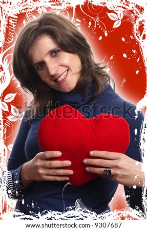 beautiful woman holding a love symbol in hands.