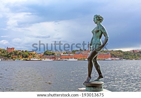 Statue of naked woman in Stockholm near the water, Sweden