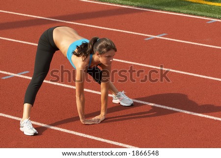 stock-photo-beautiful-young-woman-in-sports-bra-leaning-forward-and-stretching-hamstrings-1866548.jpg