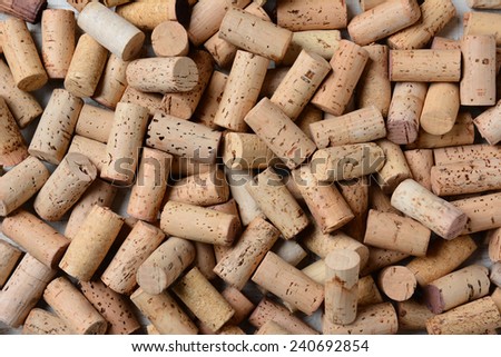 Closeup of a pile of used wine corks. Horizontal format with the corks filling the frame.