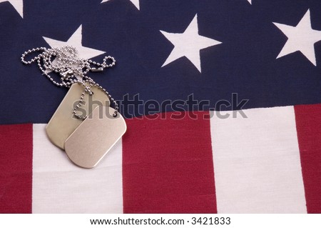 Military Dog Tags on American Flag