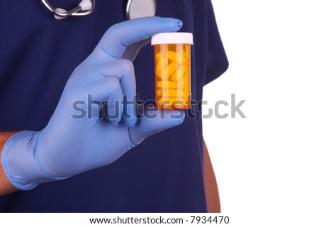 Doctor and Prescription Bottle of Pills isolated over white
