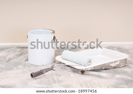 Paint Can and Roller Tray on Drop Cloth