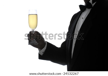 stock photo Man in Tuxedo in Silhouette Holding a Glass of Champagne