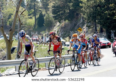 RUNNING SPRINGS, CA - MAY 21: Six cyclists lead the Amgen Tour of California towards the finish in Big Bear, CA on May 21, 2010. The Tour of California is the largest cycling event in America.