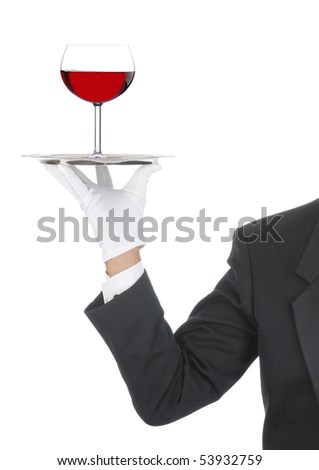 Butler wearing tuxedo and formal gloves holding a heart shaped box on a silver tray. Shoulder hand and arm only isolated on white vertical composition.