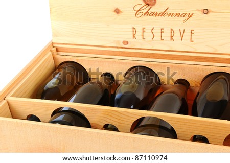 Closeup of a Wooden Case of Chardonnay Wine Bottles.