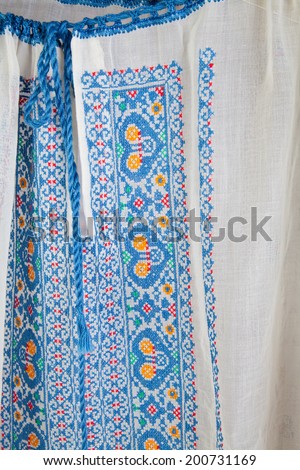 Blue embroidery on homemade blouse