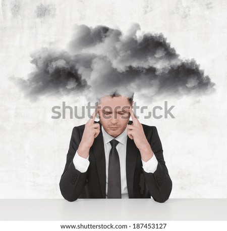 young businessman thinking with storm cloud