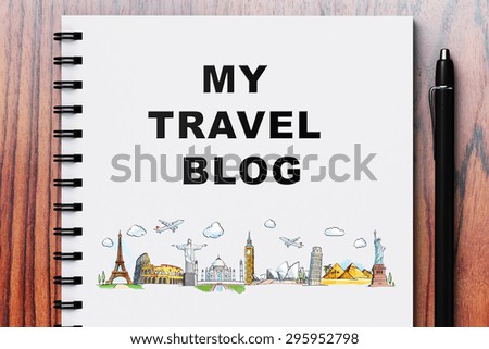 White notebook with drawing my travel blog