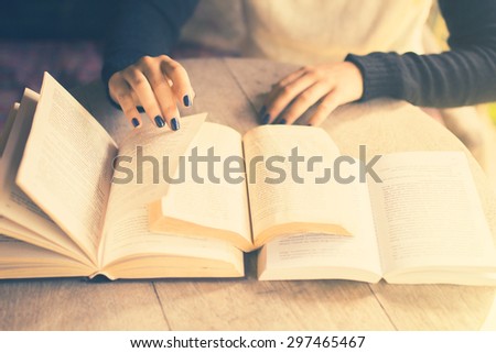 girl reading a books, vintage photo effect