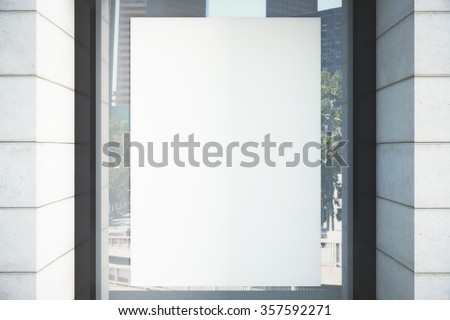 Blank white poster on the window, mock up