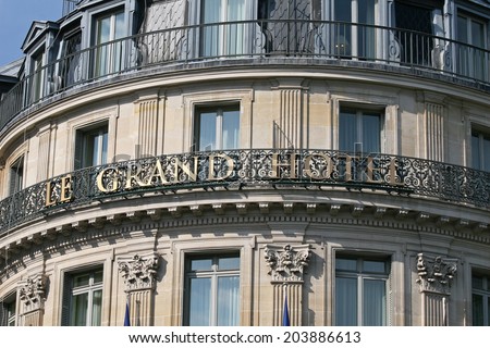 PARIS, FRANCE - JUNE 13: Le Grand Hotel facade in Paris, June 13, 2014