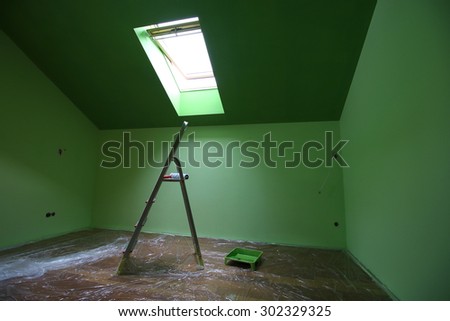 Home renovation, painting a room.