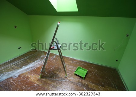 Home renovation, painting a room.