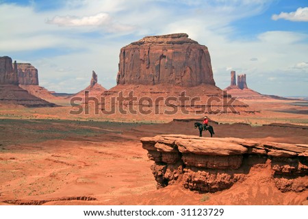 Navajo indian on pony at Monument Valley