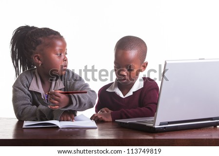 The boy is not really listening to his friend about the homework.