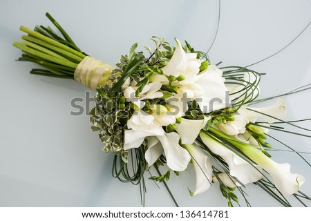 beautiful arrangement of arum lilies in a bouquet