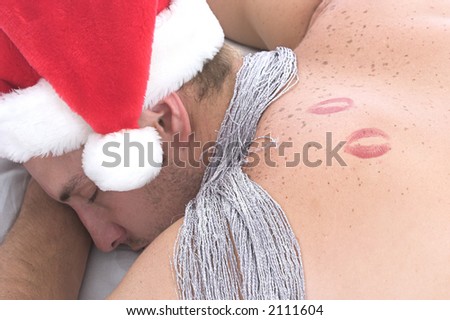 Lipstick marks on man's shoulder