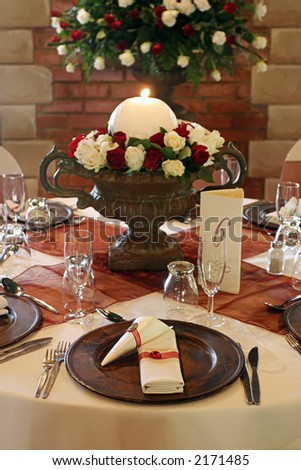 stock photo Wedding table setting with white and red roses