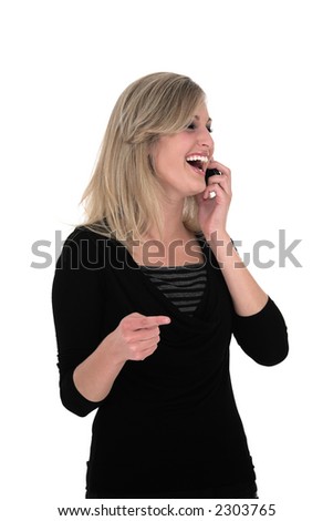 Business woman in black laughing over the phone