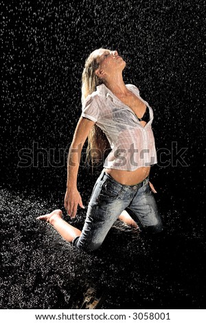 Lijepe i mokre - Page 2 Stock-photo-woman-sitting-on-her-knees-in-the-rain-3058001
