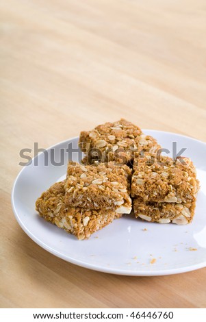 A stack of health biscuits on a white plate.